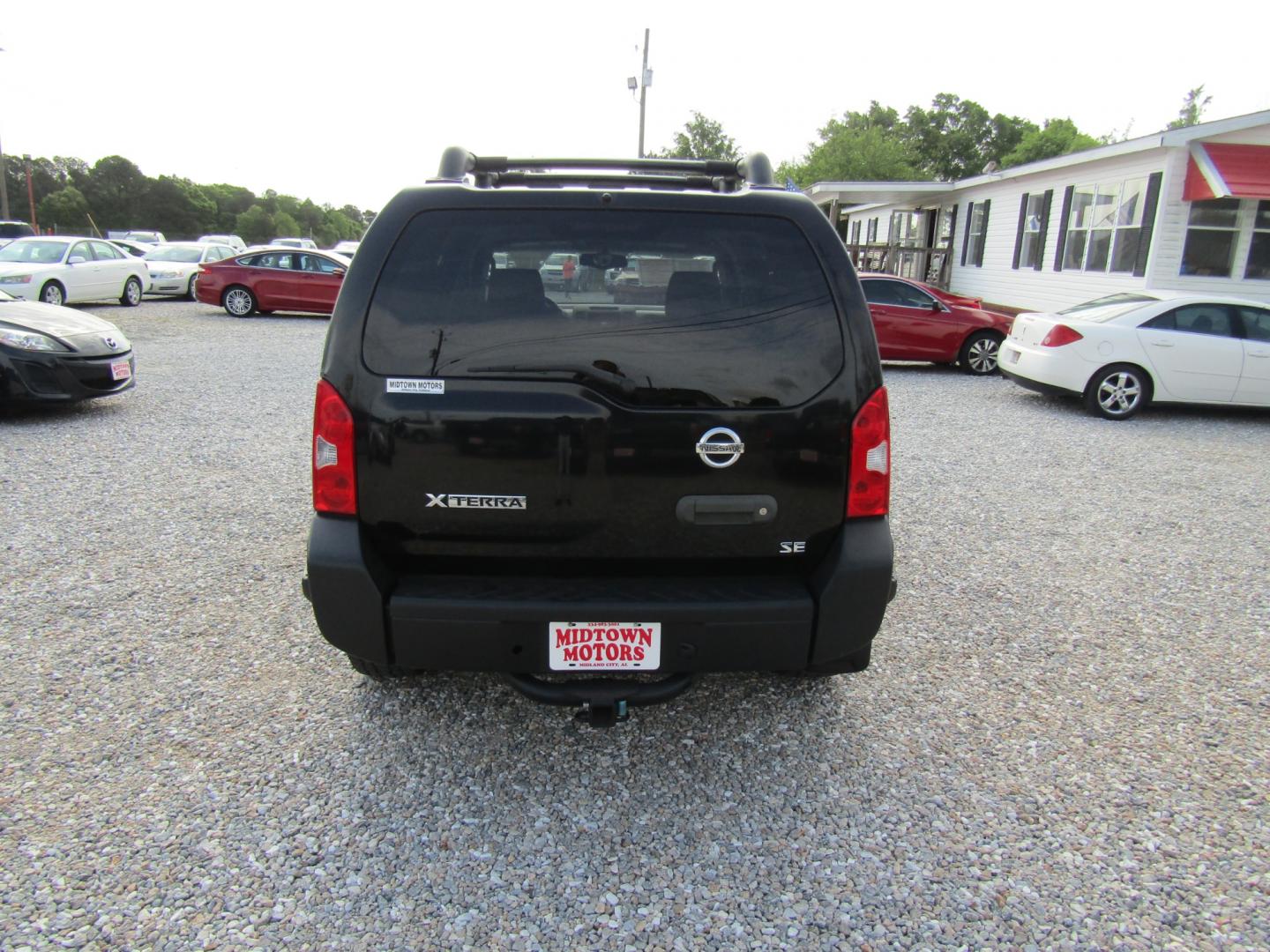 2005 Black /BROWN/TAN Nissan Xterra (5N1AN08U85C) with an 6 Cyl engine, Automatic transmission, located at 15016 S Hwy 231, Midland City, AL, 36350, (334) 983-3001, 31.306210, -85.495277 - Photo#6